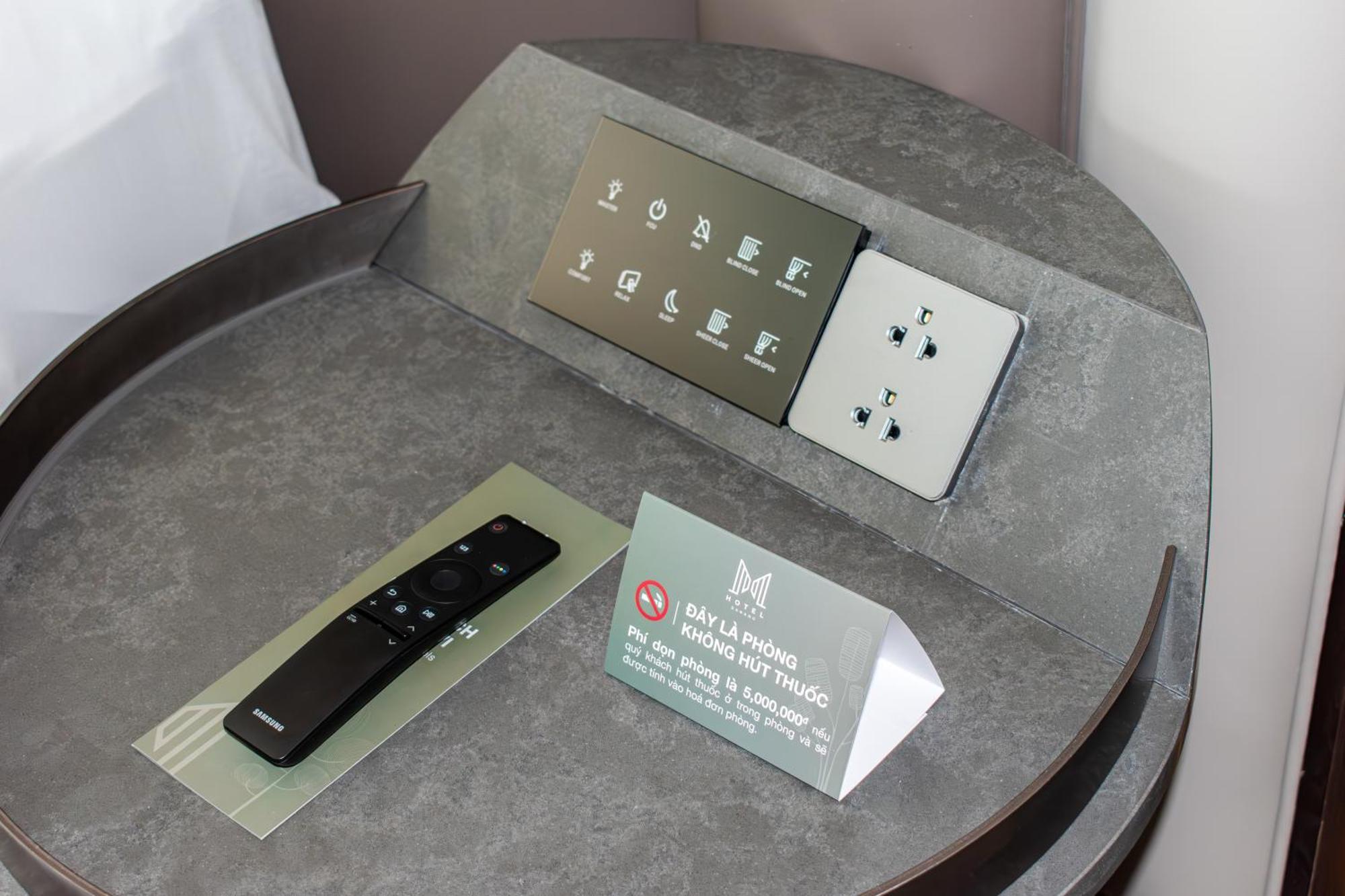 M Hotel Danang Exterior photo A room control panel