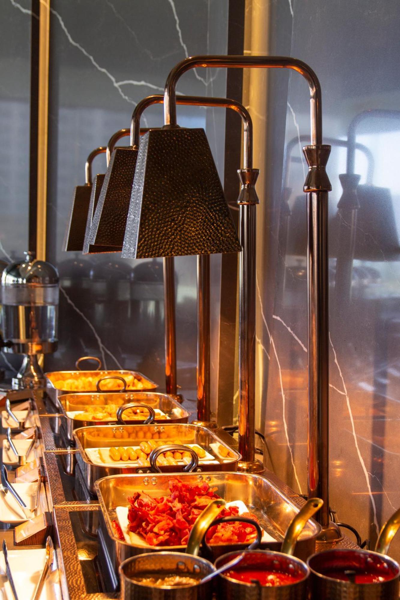 M Hotel Danang Exterior photo A chafing dish